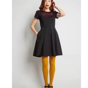 Black dress with red butterfly